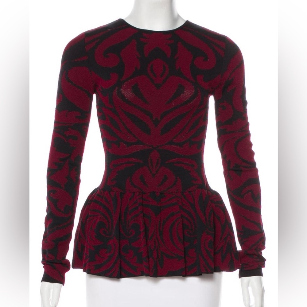 Crimson and black Torn by Ronny Kobo peplum top with abstract pattern throughout